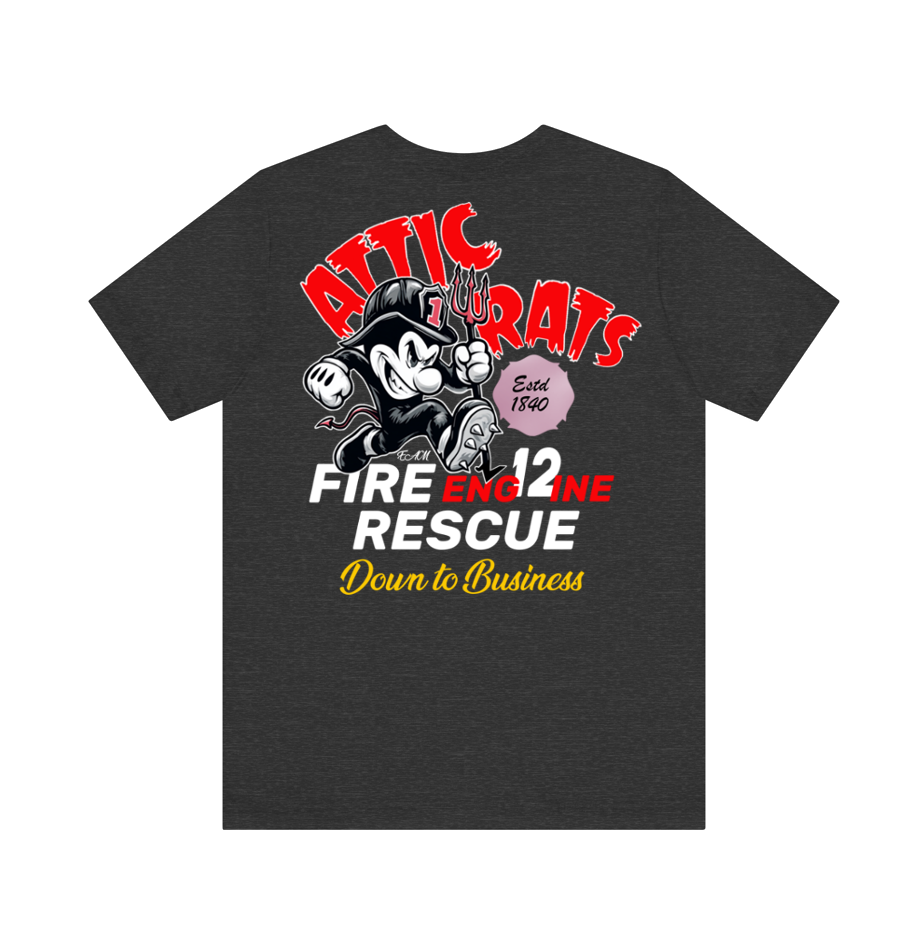A dark heather gray t-shirt featuring a retro graphic of a cartoon fire engine mouse with the text 'ATTIC RATS', 'FIRE ENGINE RESCUE', and 'Down to Business' in red, white, and yellow.
