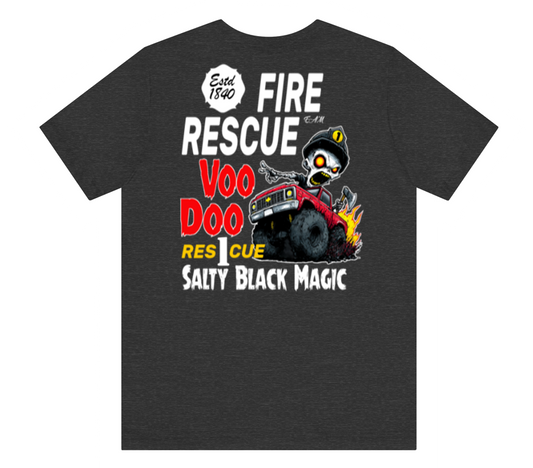 A dark heather gray t-shirt with a humorous graphic print on the front. The graphic features a cartoon zombie driver in a red fire truck with flames, surrounded by text reading 'FIRE RESCUE', 'VOO DOO', 'RES CUE', and 'SALTY BLACK MAGIC'.